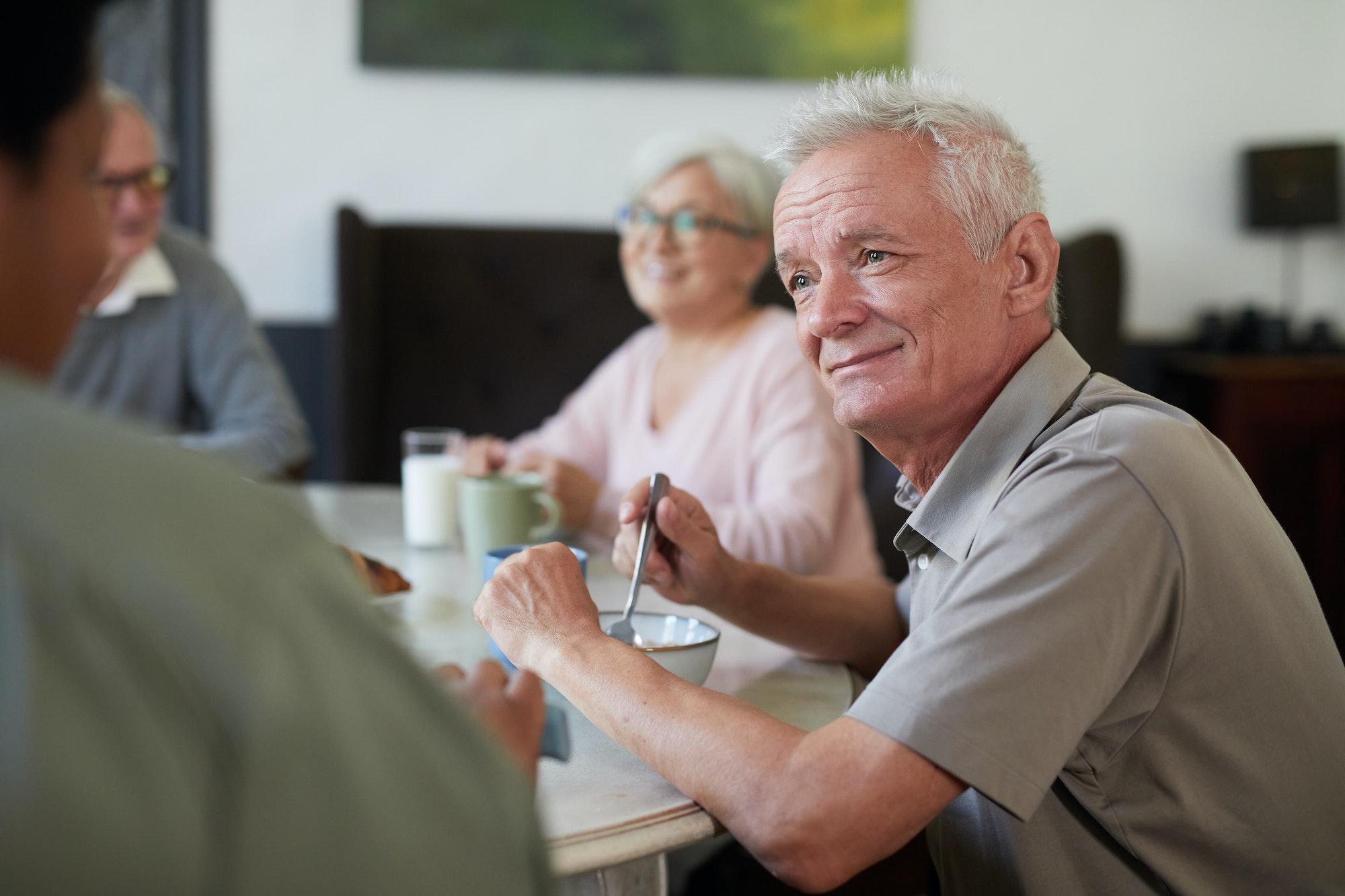 Senior Man at Breakfast in Nursing Home